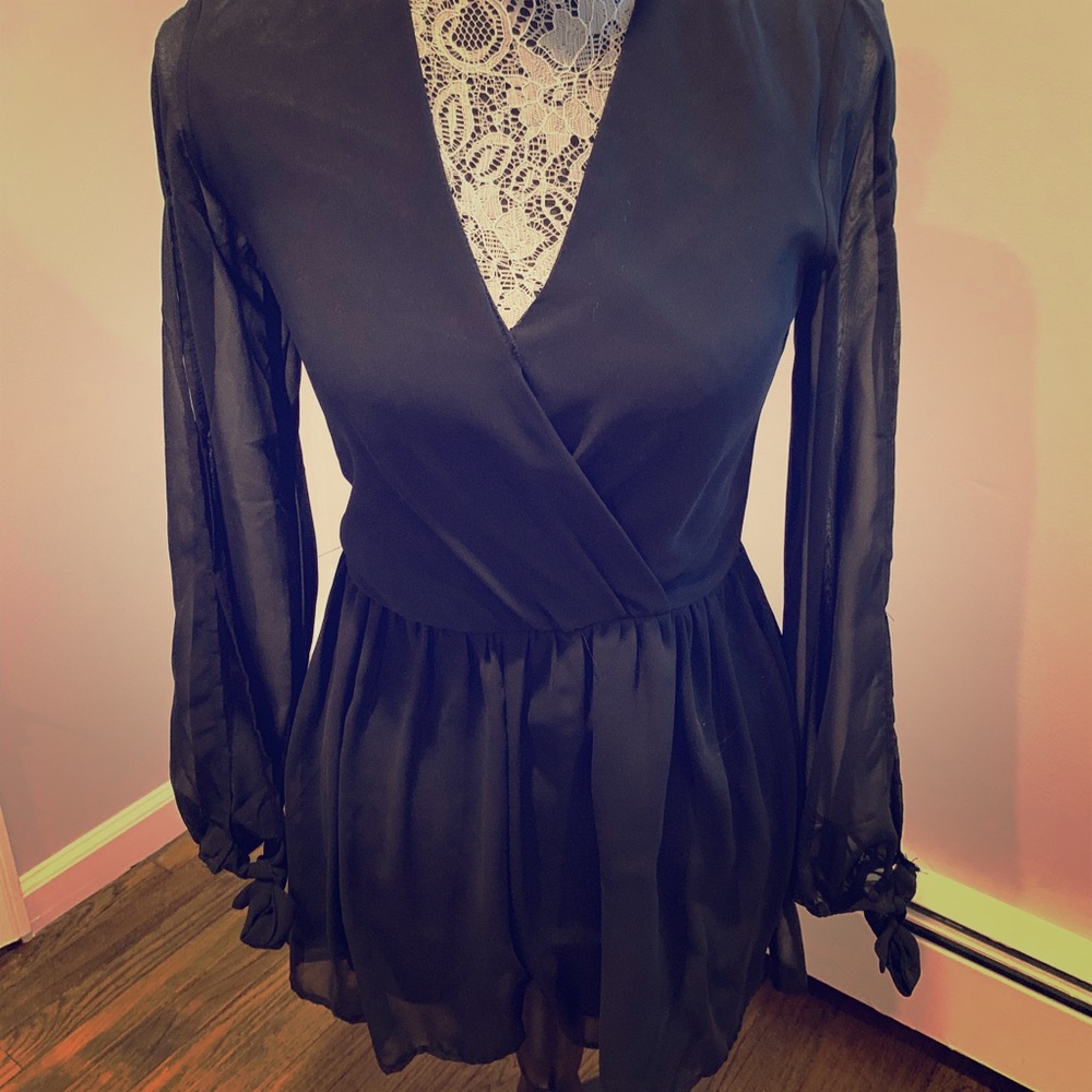 Black romper with sheer sleeves